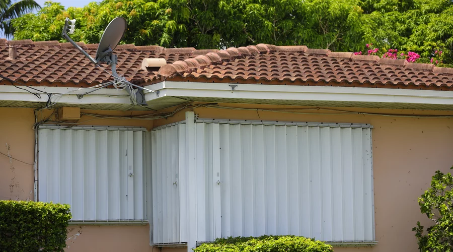 Impact Windows vs Accordion Shutters