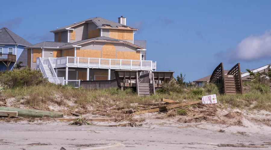 Plywood, Hurricane Shutters, or Impact Windows: How Florida Homeowners Actually Protect Their Glass